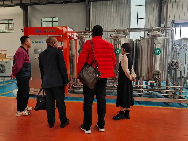 INTOP établit avec succès une ligne de production de boissons à base d'eau purifiée en Tanzanie